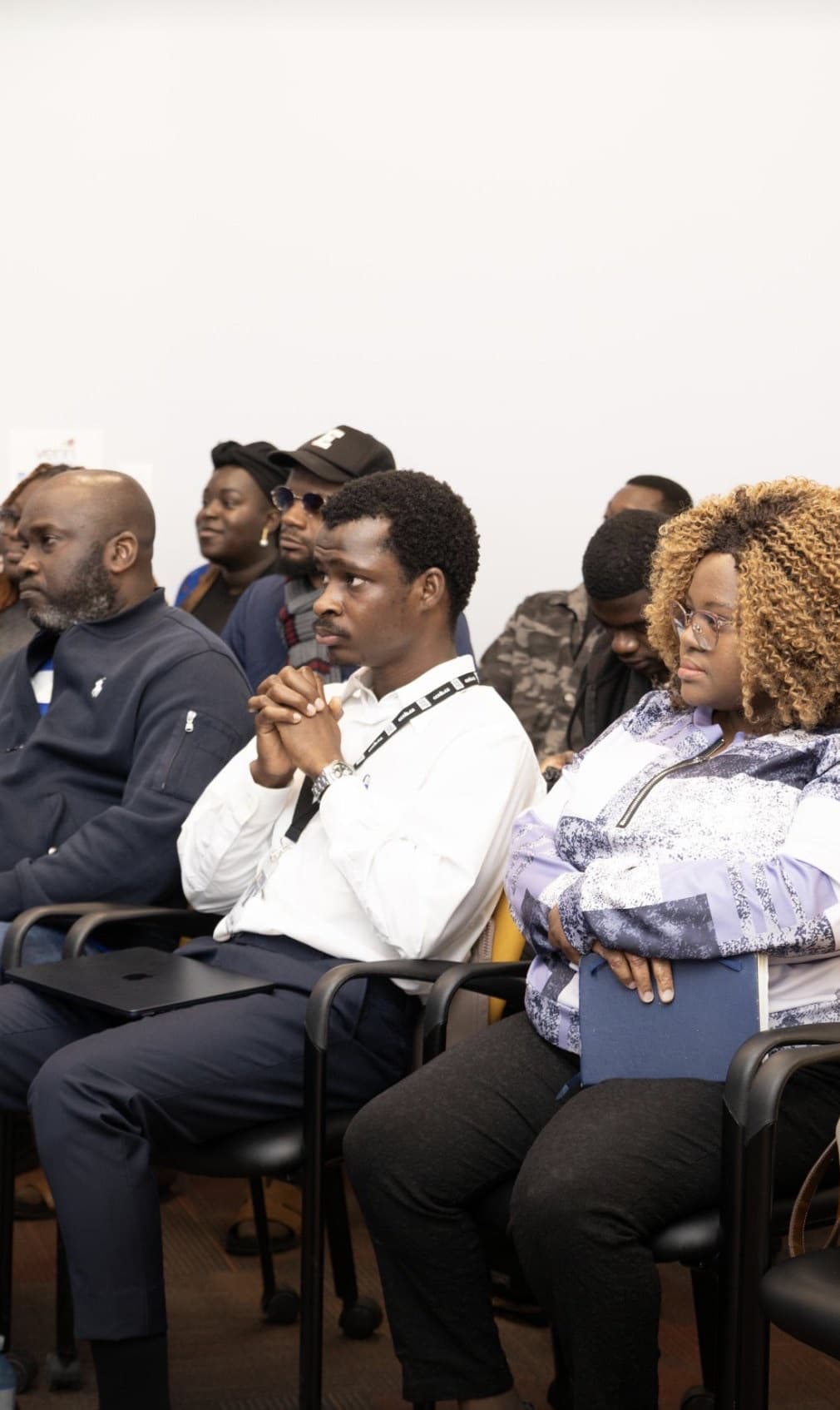 Participants listen closely from their seats